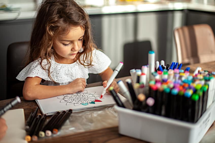 Child Using Art Markers