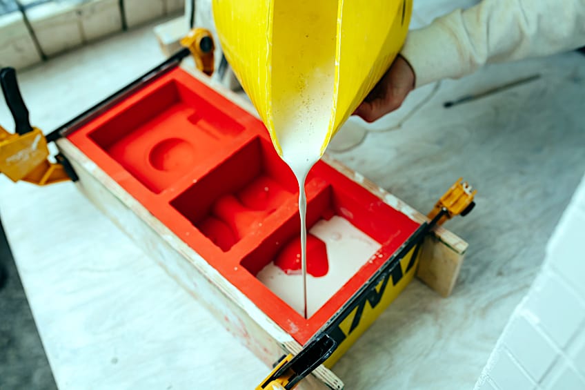 Pouring Plaster into DIY Mold
