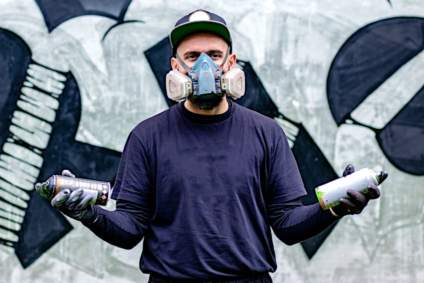 Wear Respirator for Spray Painting